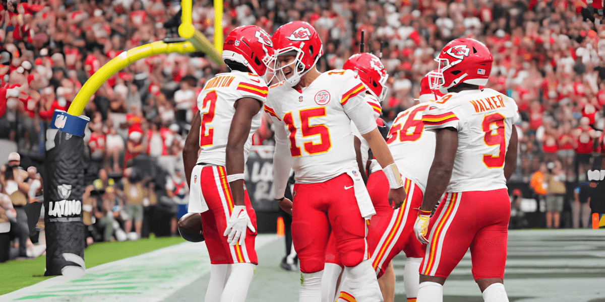 Kansas City Chiefs players celebrate a touchdown on the football field