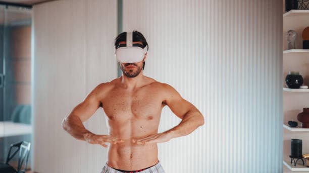 Man at home practicing tai chi with vr glasses